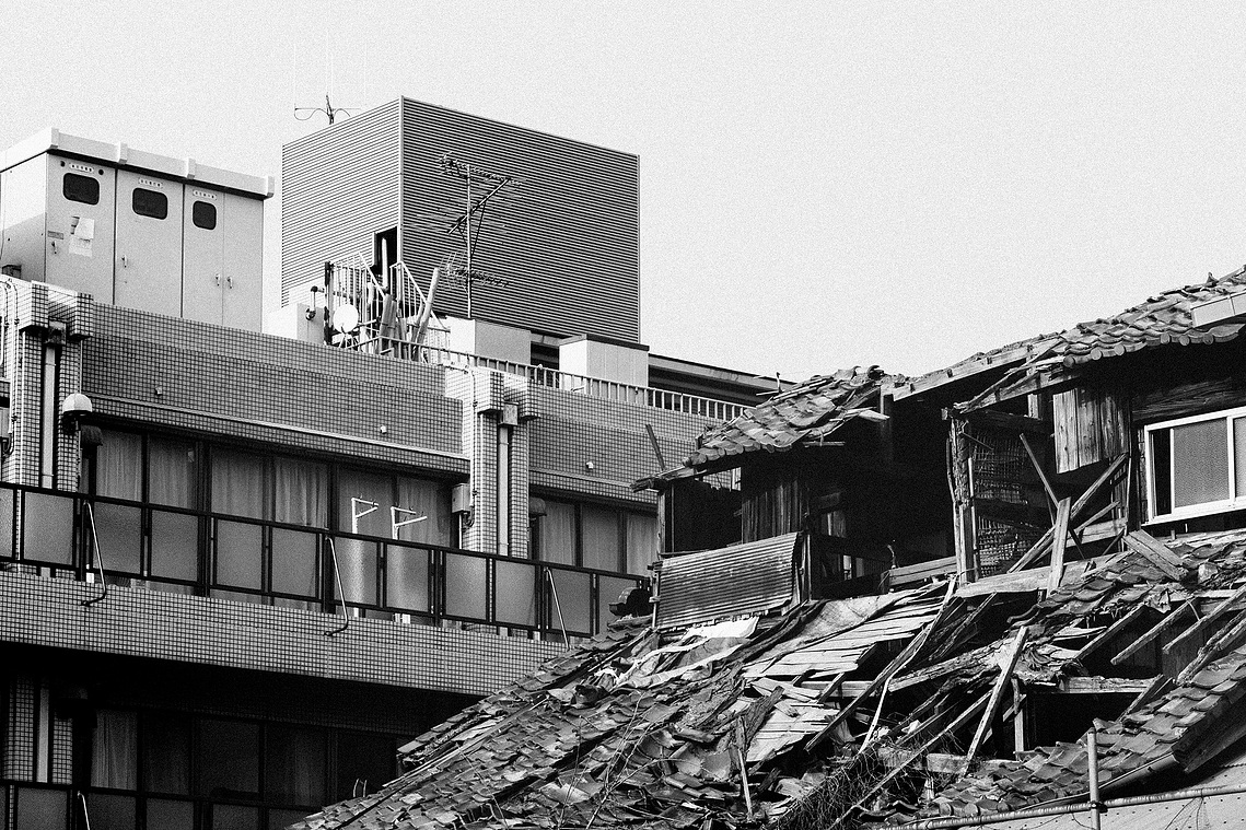 Run down collapsed building in Arashiyama, Kyoto Japan. Black and white photography by Darren Gill