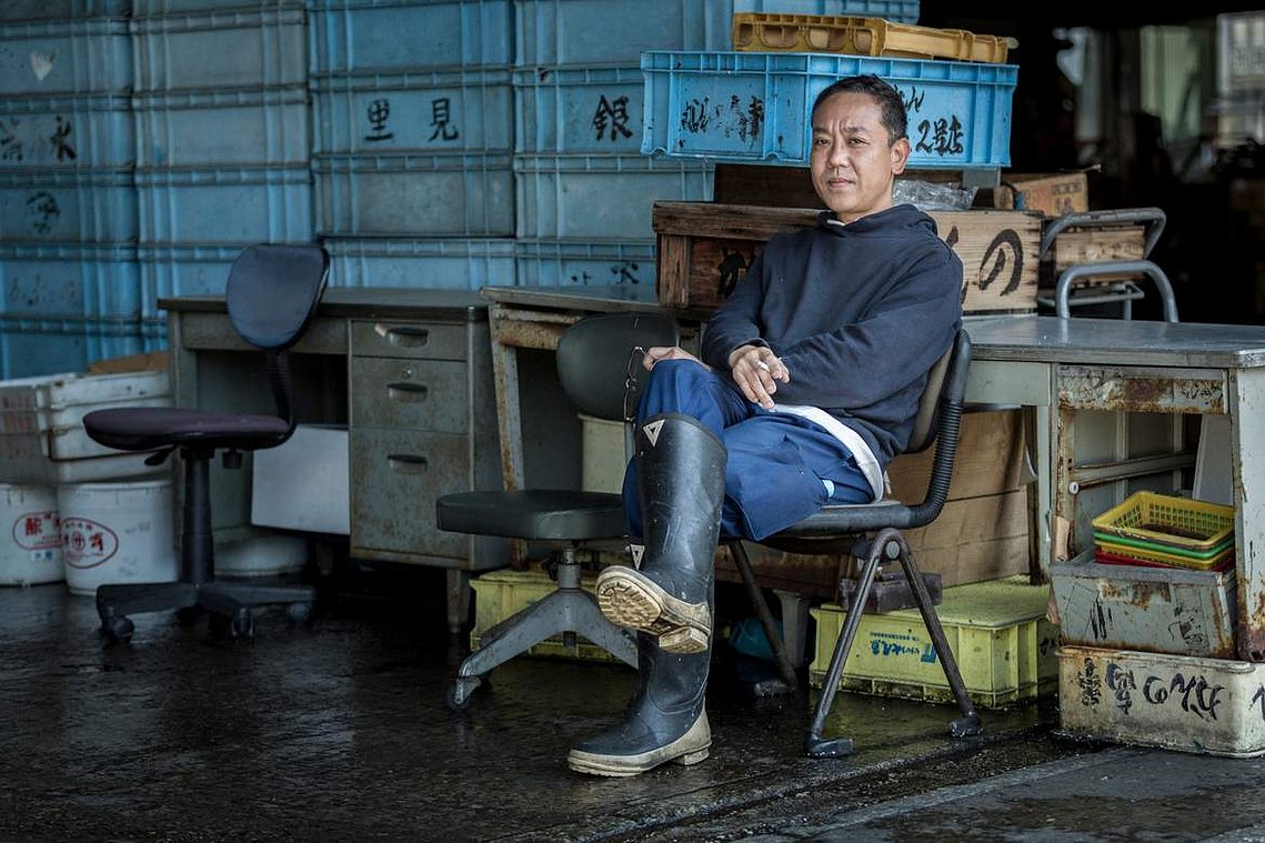 Portrait of Japanese worker at Tsukiji Fish market in Tokyo Japan. Photography by Darren Gill