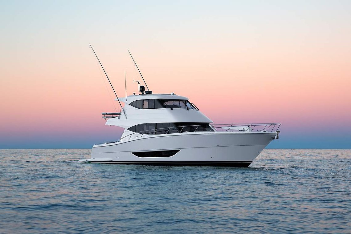 Maritimo M59 luxury motor yacht photographed at dusk at Pittwater, Sydney