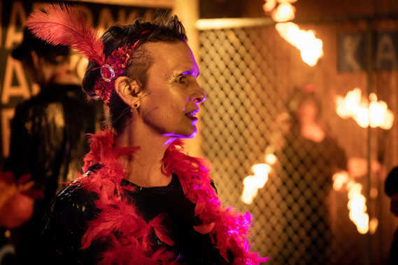 Actor performing cabaret with fire twirling at La Mama Theatre in Carlton, Melbourne. Photography by Darren Gill