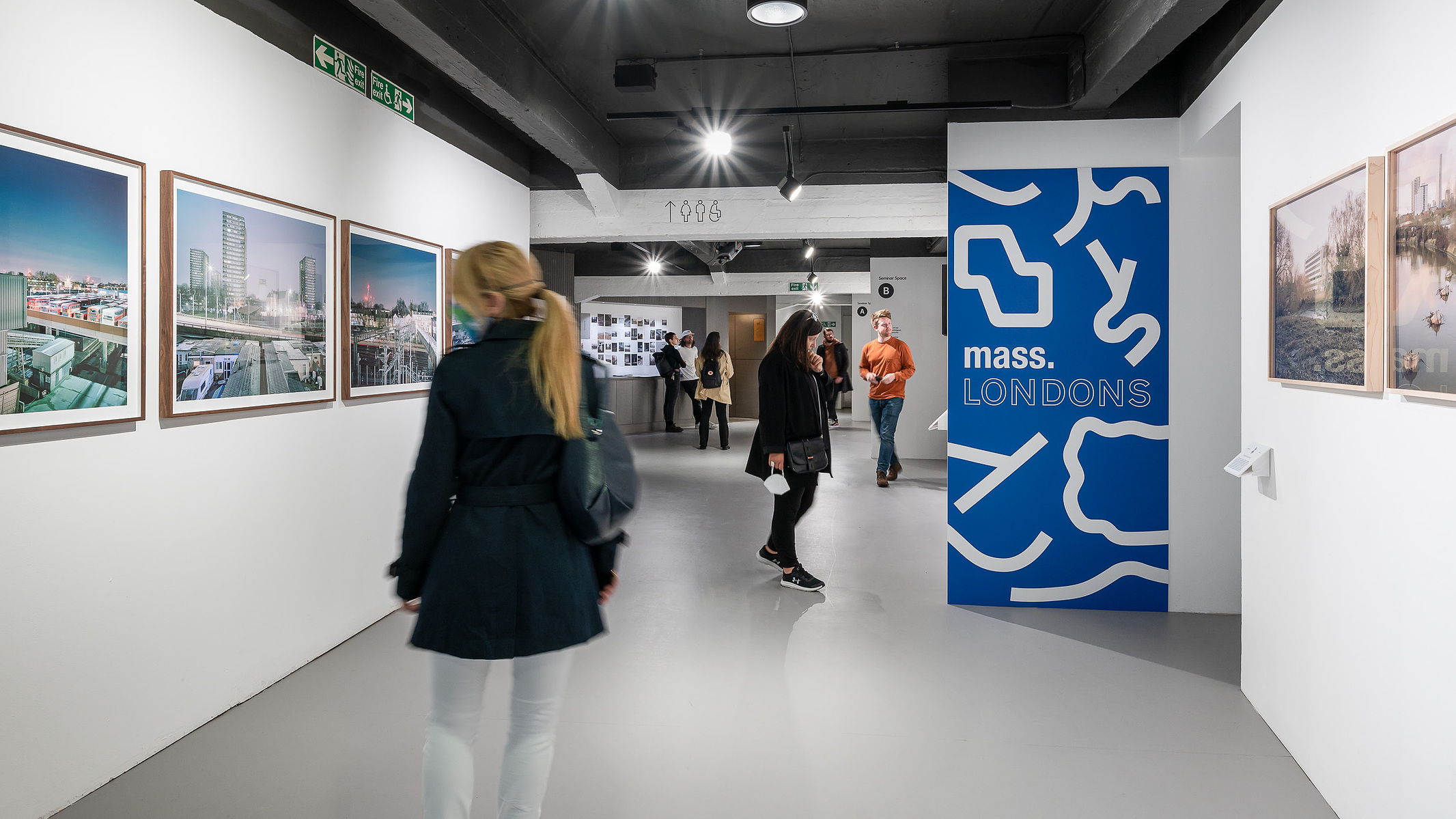 View of the photographic exhibition setup with fine art prints and custom frames at the Building Centre, London