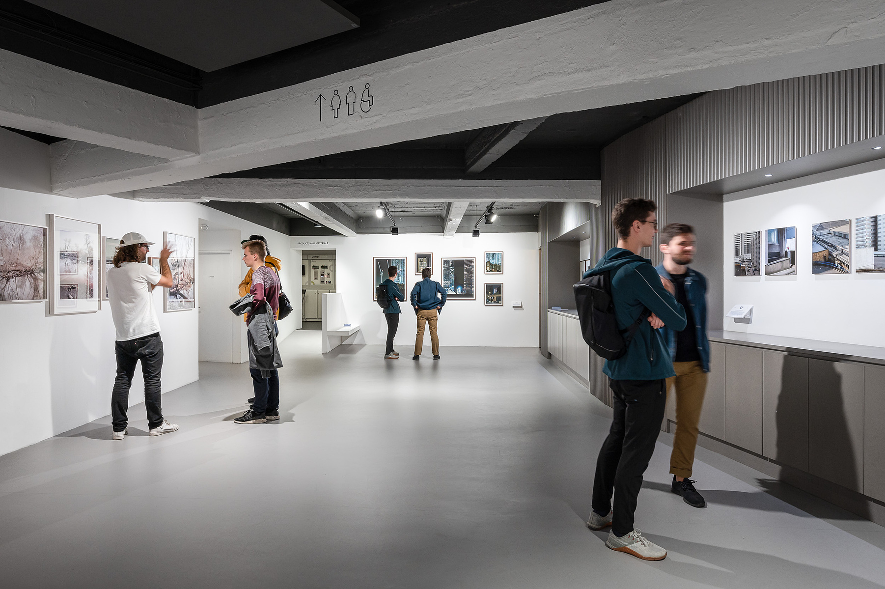 View of the photographic exhibition setup with fine art prints and custom frames at the Building Centre, London