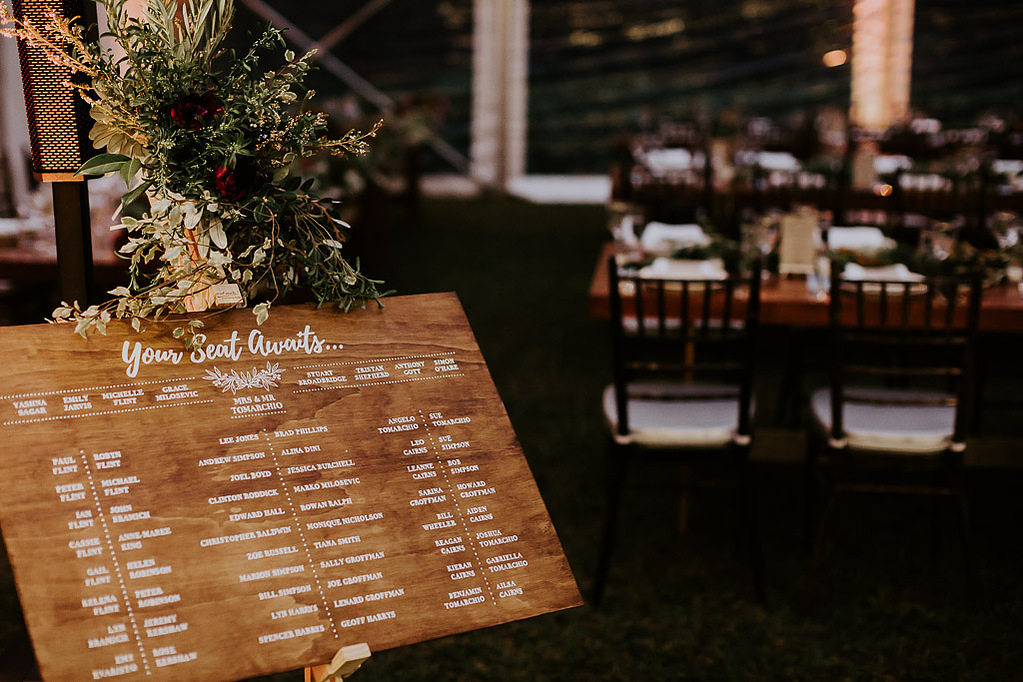 Wooden wedding seating chart - hand lettered