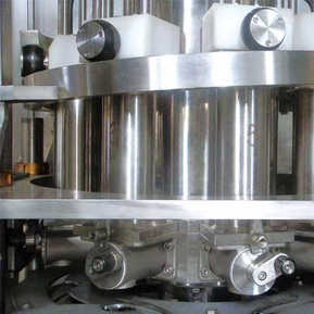 EDELSTEIN Rotary Type Bottle Piston Filling Machine