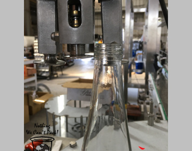 Glass Bottle Filling Line for Drinking Water:  In-Line ROPP Capper