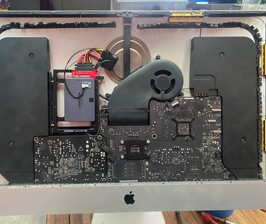 In this old mac that was given to me, I upgrade the dead hard drive to an SSD drive, replaced the motherboard because the built-in video card was dying, and maxed out the ram. I also decided to turn it into a Linux machine for animation studio.
