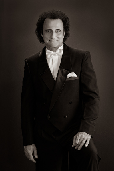 B&W photo of Male opera singer in Tuxedo tails