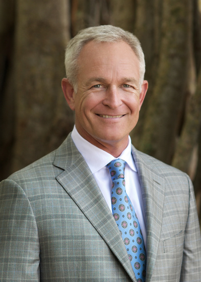 Outdoor Male Executive Headshot in suit.