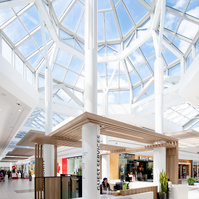 White Oaks Mall London Ontario by Frank Fenn IDEA3 Photography interior features skylights and customer service kiosk