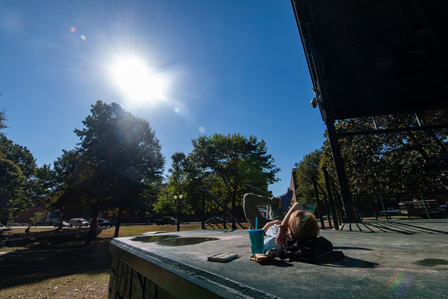 Emma Kirkwood, a freshman student, sun bathes and listens to music at the Grove Stage. Photo by Srijita Chattopadhyay&amp;amp;amp;amp;amp;#x2F; Ole Miss Digital Imaging Services