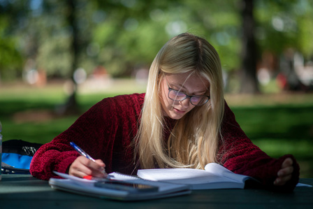 Katelyn Watson, a biomedical engineering major studies for finals at the Grove on May 3, 2023. Photo by Srijita Chattopadhyay&amp;amp;amp;amp;amp;#x2F; Ole Miss Digital Imaging Services