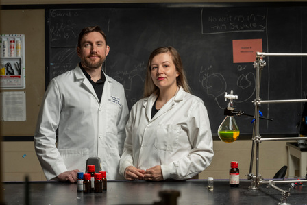 Dr. Eden Tanner and Dr. Jason Paris at Coulter Hall Lab with Ionic Liquid. The pair received a grant from the NIH to study a treatment for neuro-HIV, which is the neurological effects that happen in HIV patients (such as dementia, stroke, seizures, etc.) 