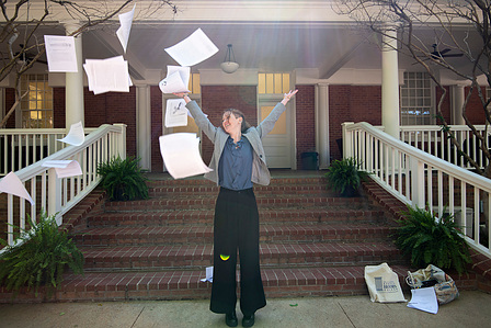 Kaleigh Breisch, a student at the Croft institute of International Studies, tosses pages of her thesis in celebration of passing her defense on May 3, 2023. Photo by Srijita Chattopadhyay&amp;amp;amp;amp;amp;#x2F; Ole Miss Digital Imaging Services