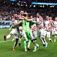 Mario Pasalic of Croatia celebrates with Goalkeeper Dominik Livakovic after scoring he winning penalty, Japan v Croatia, FIFA World Cup 2022, Round of 16, Football, Al Janoub Stadium, Al Wakrah, Qatar - 05 Dec 2022, Michael Zemanek/Shutterstock