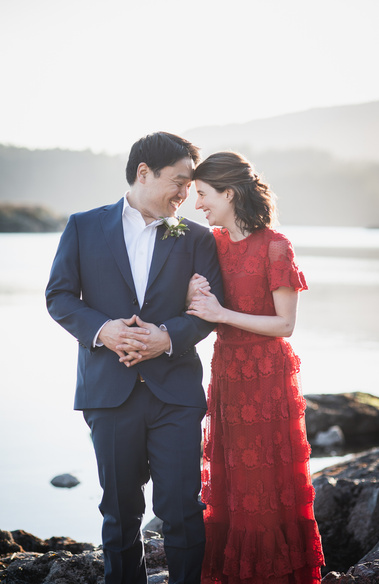 Couple laughing on their wedding day