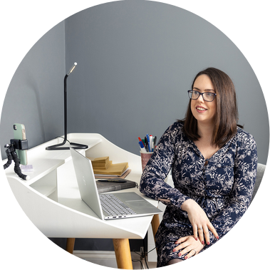 Fiona Hogan sitting at her desk personal branding photography