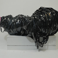 CDs, paint, tapes, wire
26" x 52" x 34"