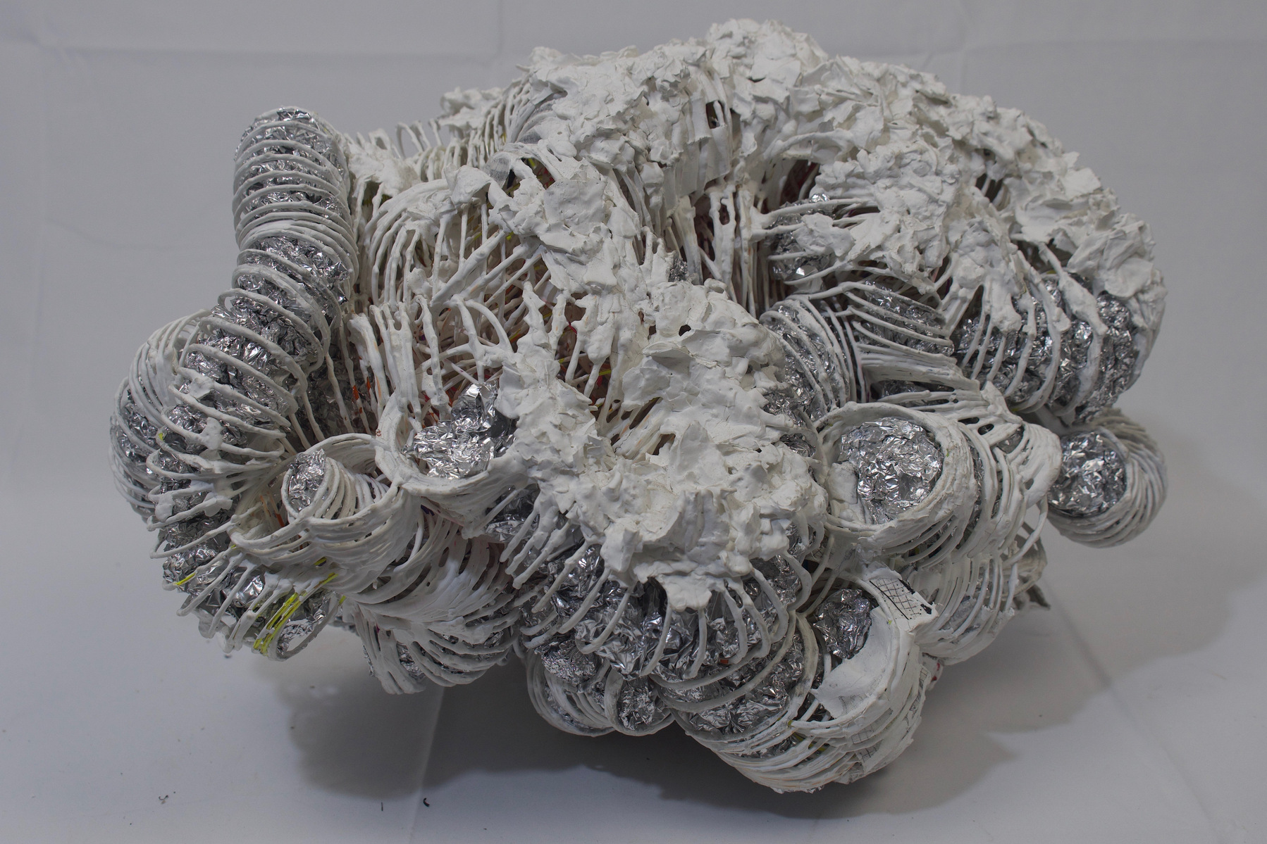 Slinky Dinks, fabric, paint, tin foil
32" x 46" x 29"