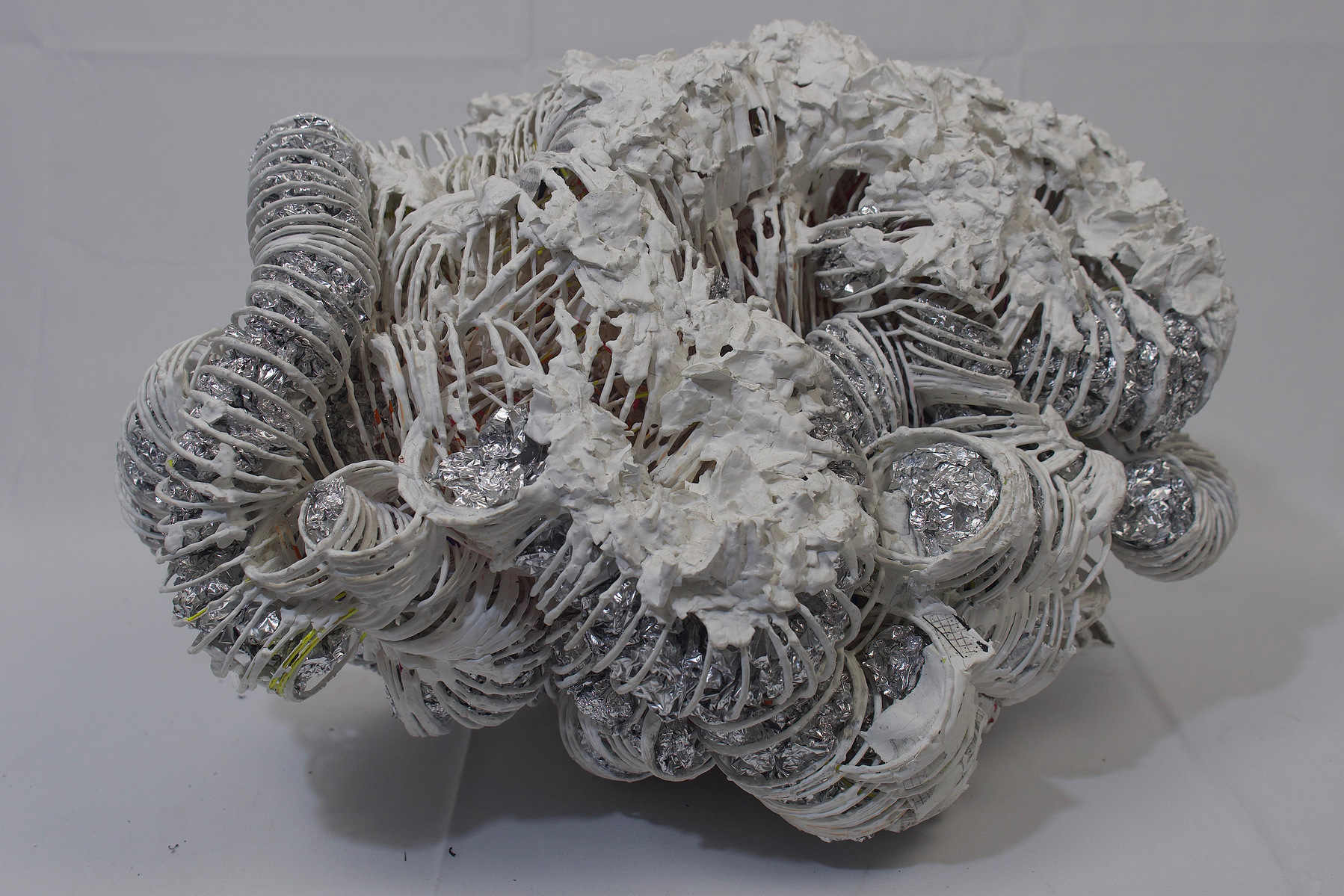 Slinky Dinks, fabric, paint, tin foil
32" x 46" x 29"