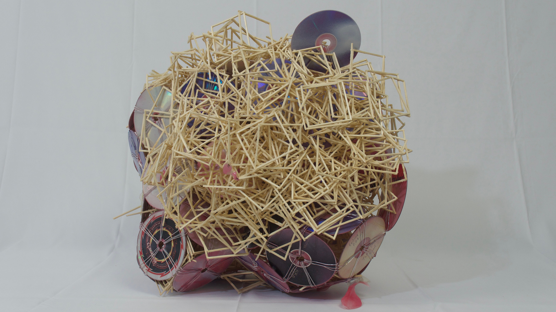 CDs, spray paint, sticks, mod podge
38" x 32" x 41"
