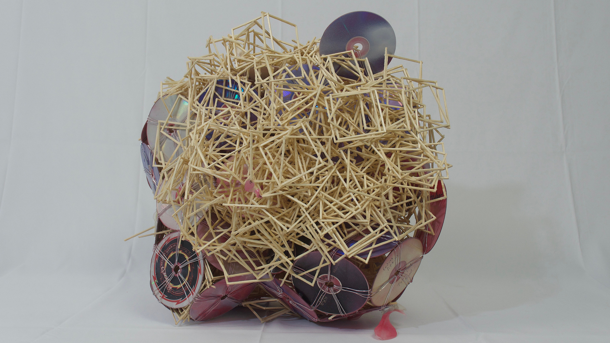 CDs, spray paint, sticks, mod podge
38" x 32" x 41"