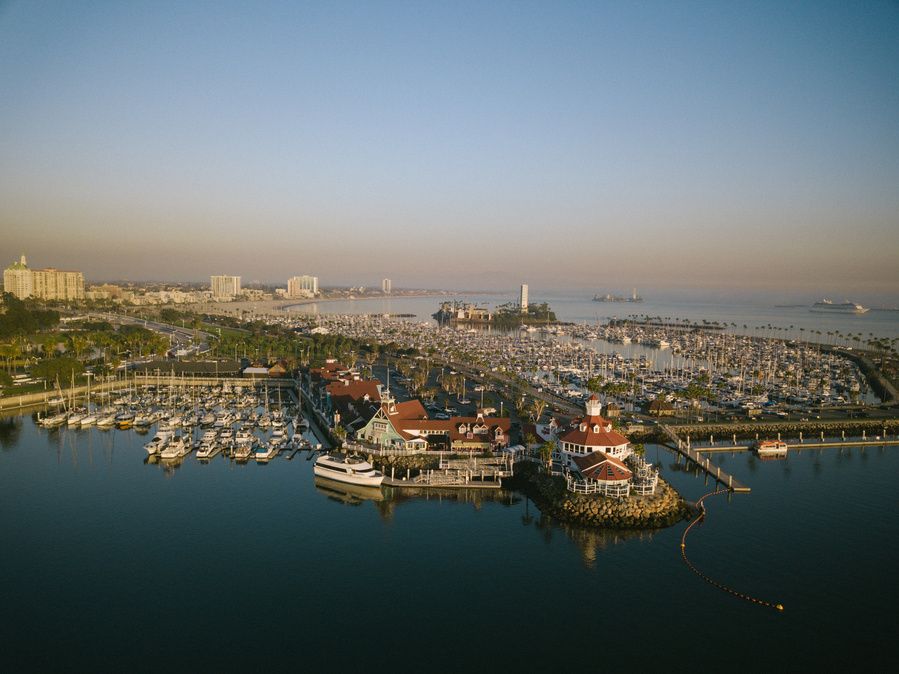 Parkers' Lighthouse and the Shoreline Village in Long Beach captured during sunset. 