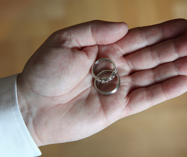 Close up of wedding rings in grooms hand wedding day photography Dublin 