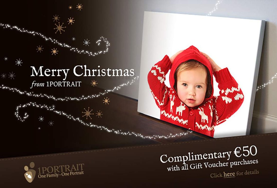 Christmas portrait of a young girl wearing a red Christmas jumper in a professional family portrait photography studio with white background offering Photography Gift Voucher Unique personal Christmas gift special offer