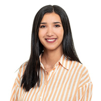 Professional linkedIn headshot of female with white background
