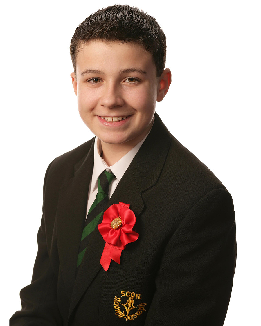 Confirmation Portrait of young boy taken in Professional Family Photography Studio with white background