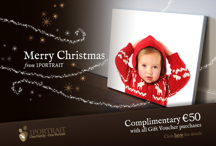 Christmas portrait of young girl wearing red Christmas jumper in professional family portrait photography studio with white background offering Photography Gift Voucher Unique personal Christmas gift special offer