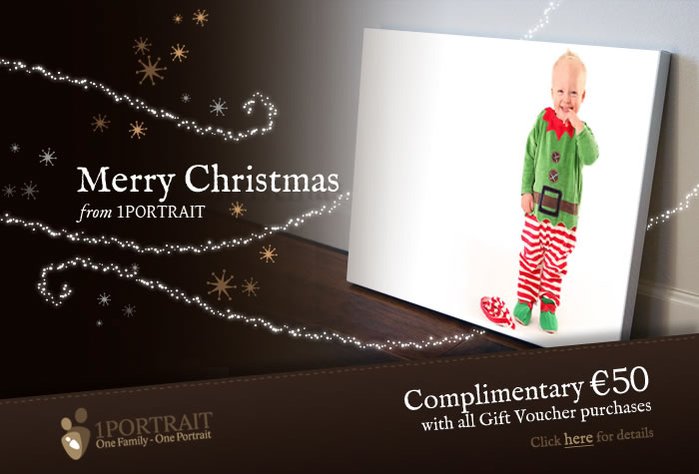 Christmas portrait of little boy wearing elf costume in professional family portrait photography studio with white background offering Photography Gift Voucher Unique personal Christmas gift special offer