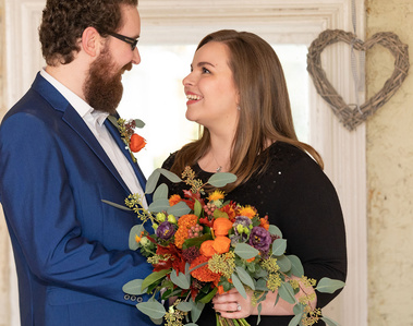 Professional portrait at a Civil Wedding Ceremony bride and groom couple smiling with bouquet of flowers wedding photographer Dubin  