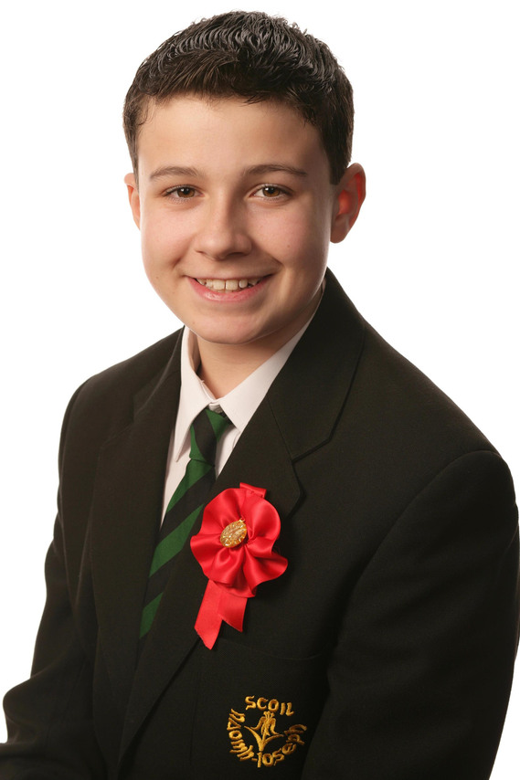 Confirmation Portrait of young boy taken in Professional Family Photography Studio with white background