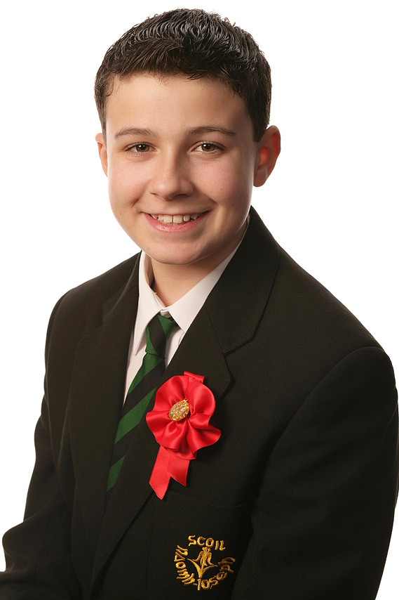 Confirmation Portrait of young boy taken in Professional Family Photography Studio with white background
