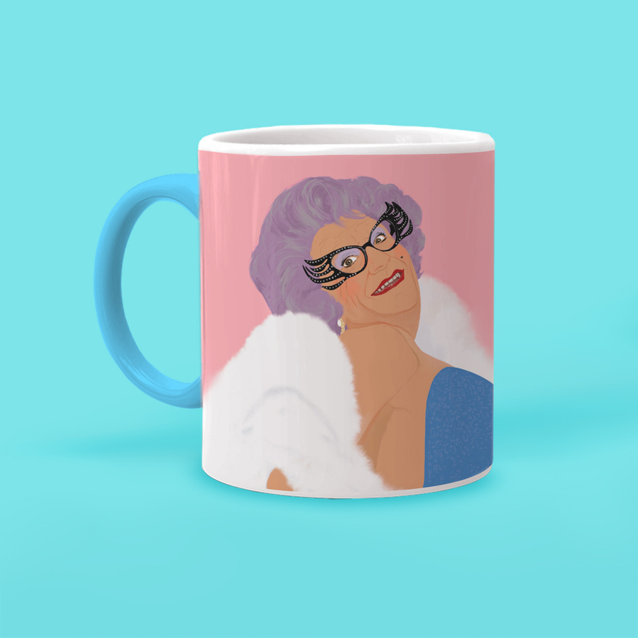 Dame Edna Everage white and blue two tone mug with blue handle and inside.  features artwork by Ryan Hodge illustration and the phrase "Hello Possums!".  camp Pink colours, gay icon, Australian Gigastar.  Purple hair and glasses.  