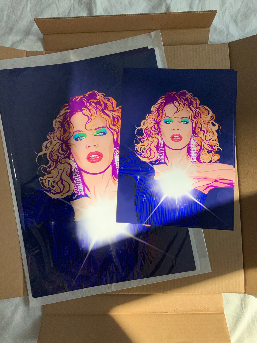 Kylie Minogue fine art giclée print by Ryan Hodge illustration.  Inspired by the album DISCO.  Cosmic vibes on navy with big bright flash.  Available in sizes A4, A3, A2 & A1 framed and print only.  Printed on Enhanced Matt Art paper. 