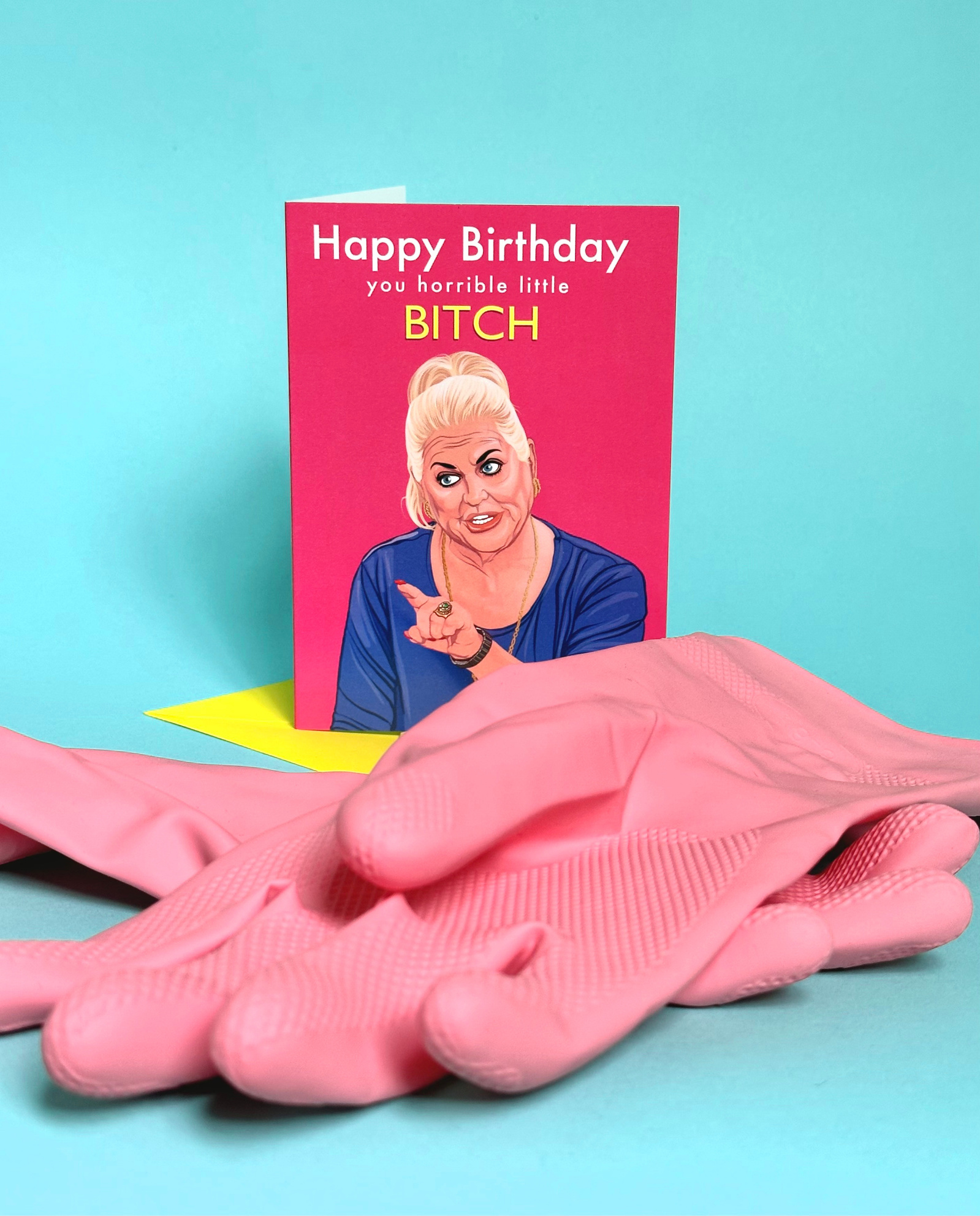 Pink Kim Woodburn A6 Greetings card with yellow envelope by Ryan Hodge illustration.  Funny card, celebrity cleaner and bitch.  