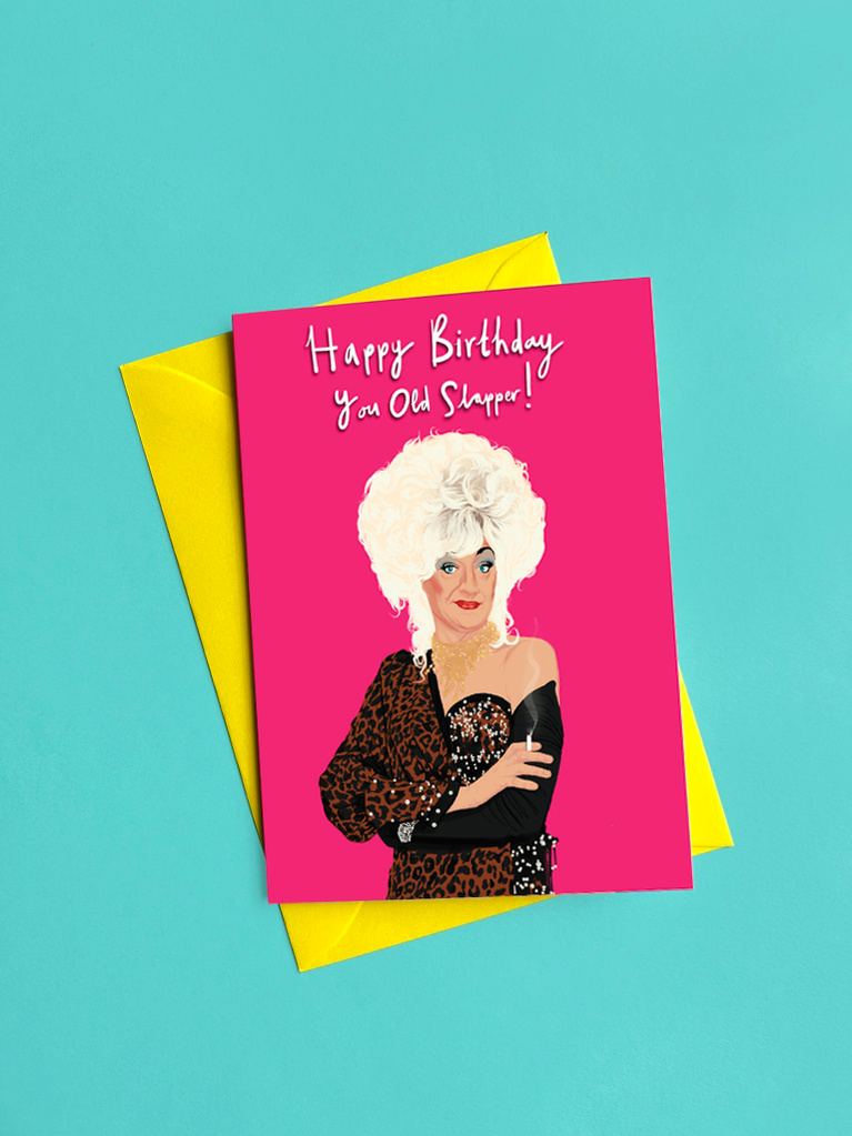 Lily Savage A6 Birthday Card.  Happy Birthday You old Slapper!  Pink card with lemon yellow envelope.  Drag queen persona of Paul O'Grady.  