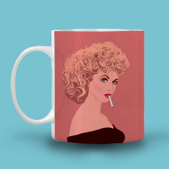 11oz Ceramic mug featuring artwork by Ryan Hodge illustration of Olivia Newton-John as Sandy Olsson in the musical Grease. 
