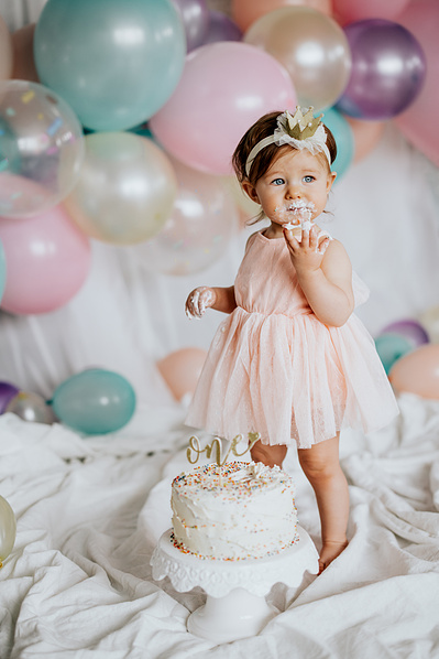 baby girl's 1st birthday Colorado milestone cake smash