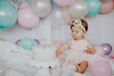 baby girl's 1st birthday Colorado milestone cake smash