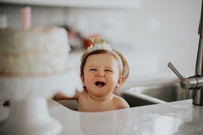baby girl's 1st birthday Colorado milestone cake smash