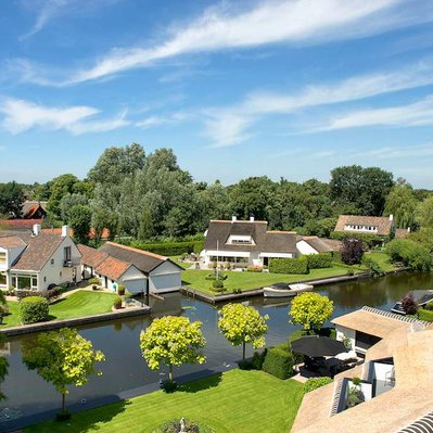 Example image of riverside property using elevated photography 