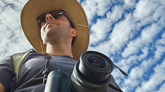 Portrait of photographer Milos Tomic – creative, professional, and dedicated to capturing authentic moments at events, weddings, and celebrations. Taken as a selfie photo on a bright sunny day in the mountains of Peru, visiting Machu Picchu.