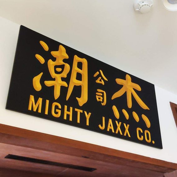 Workshop in Singapore using CNC to produce wood furniture and signboards. 
