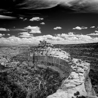 This is the final approach to the Citadel Ruin in southern Utah with dramatic clouds hovering over Road Canyon.