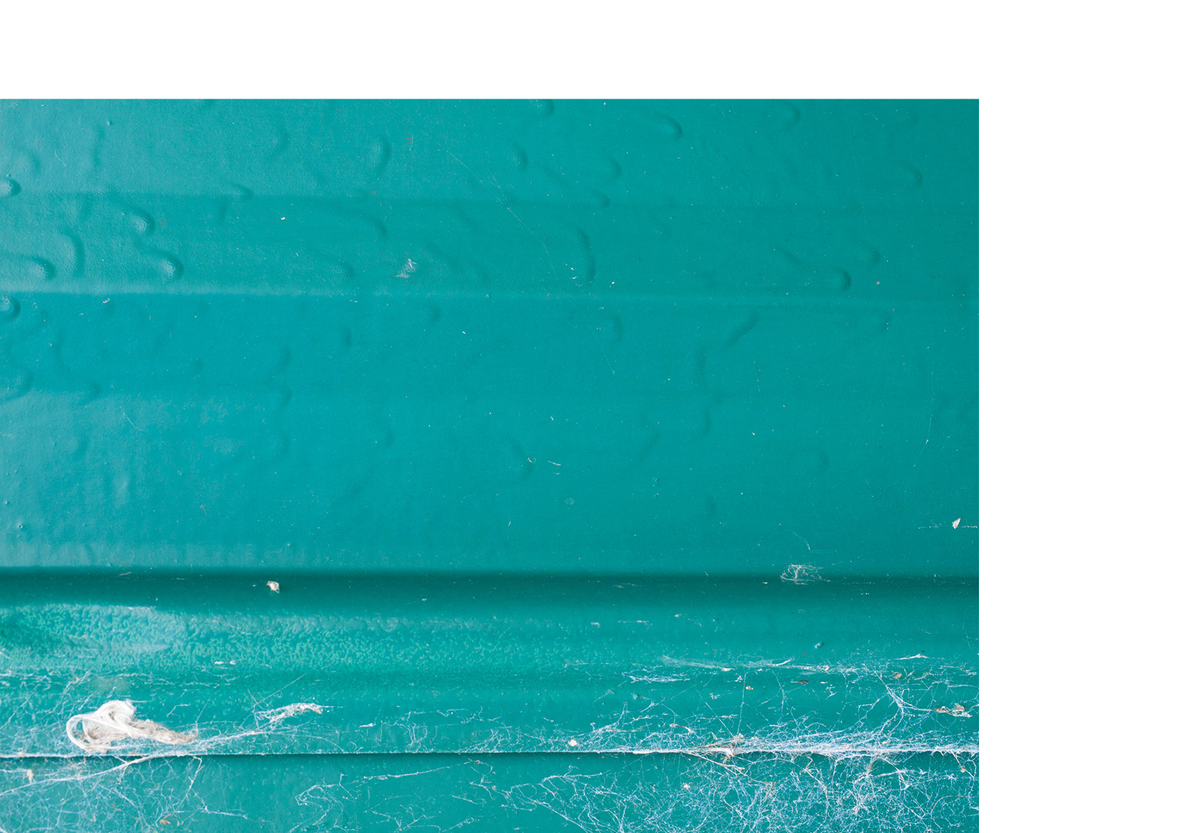 Turquoise paint resembling a seascape