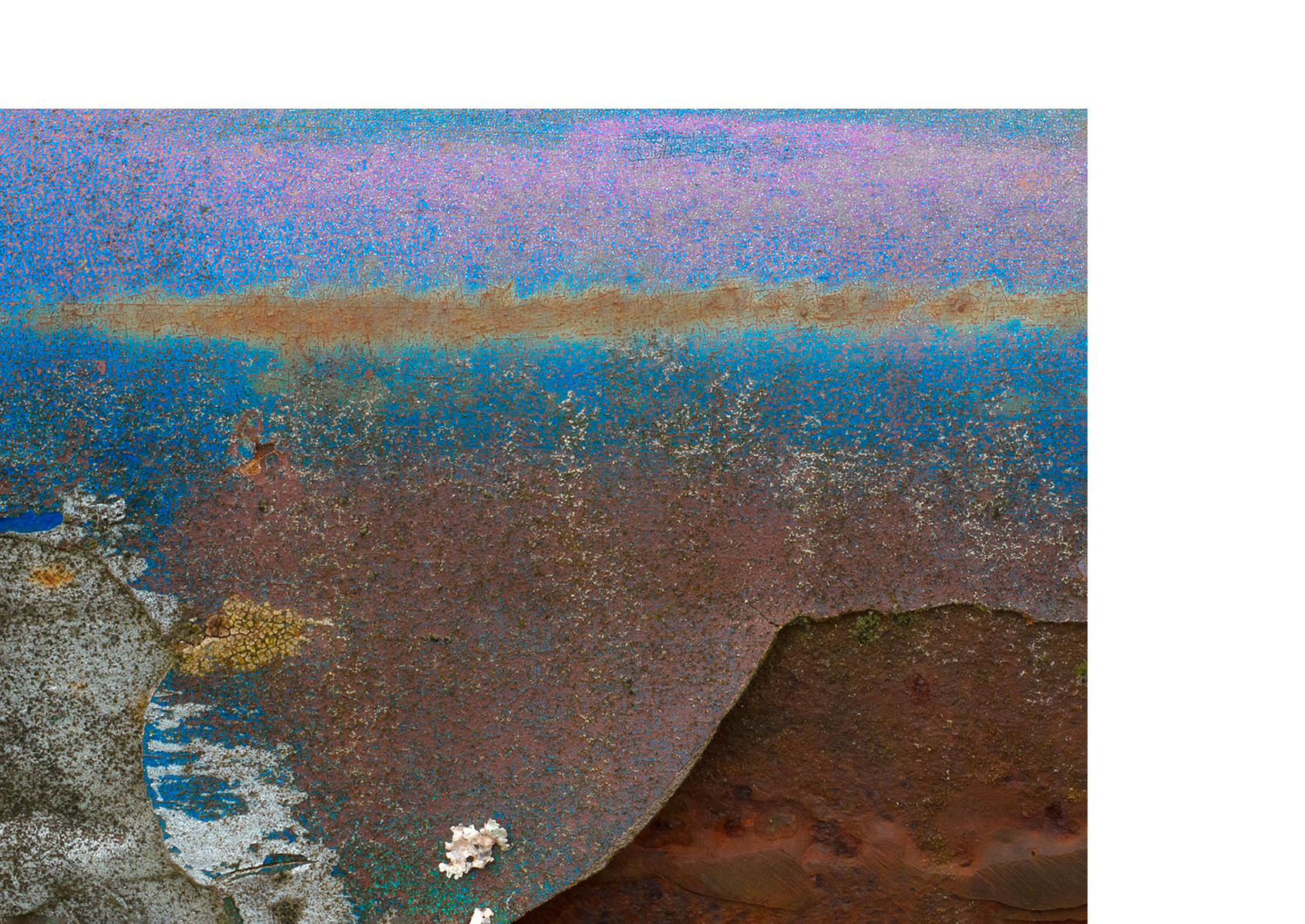 Multi coloured rust resembling a mountain range