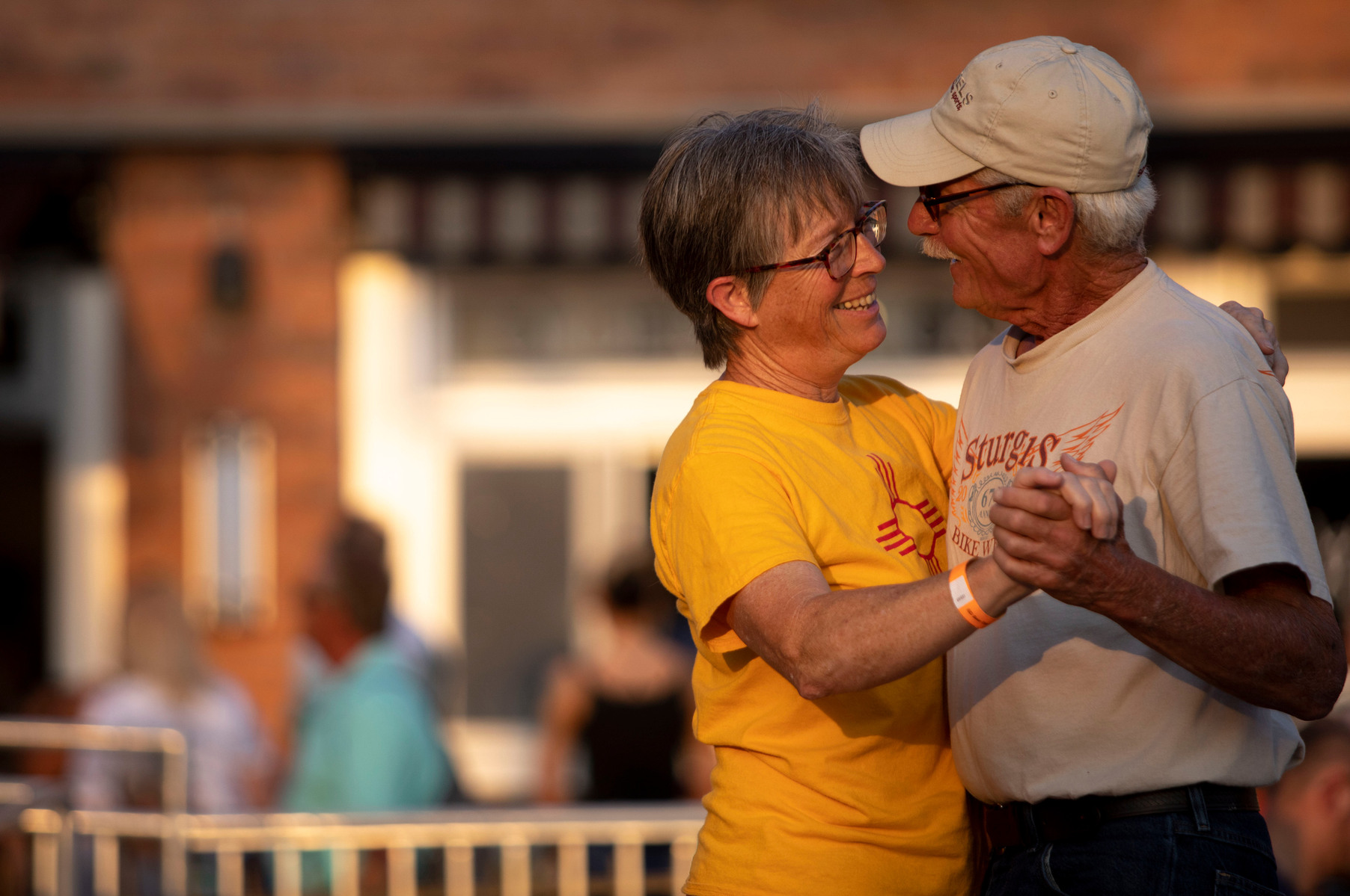 Married couple of 40 years Jean Nash (left) and Bob Nash dance to live music at Main Street Square during the Splash Patio event on Thursday, July 15, 202, in Rapid City, S.D. Nash said she loves what events like Splash Patio do for the downtown area. "I
